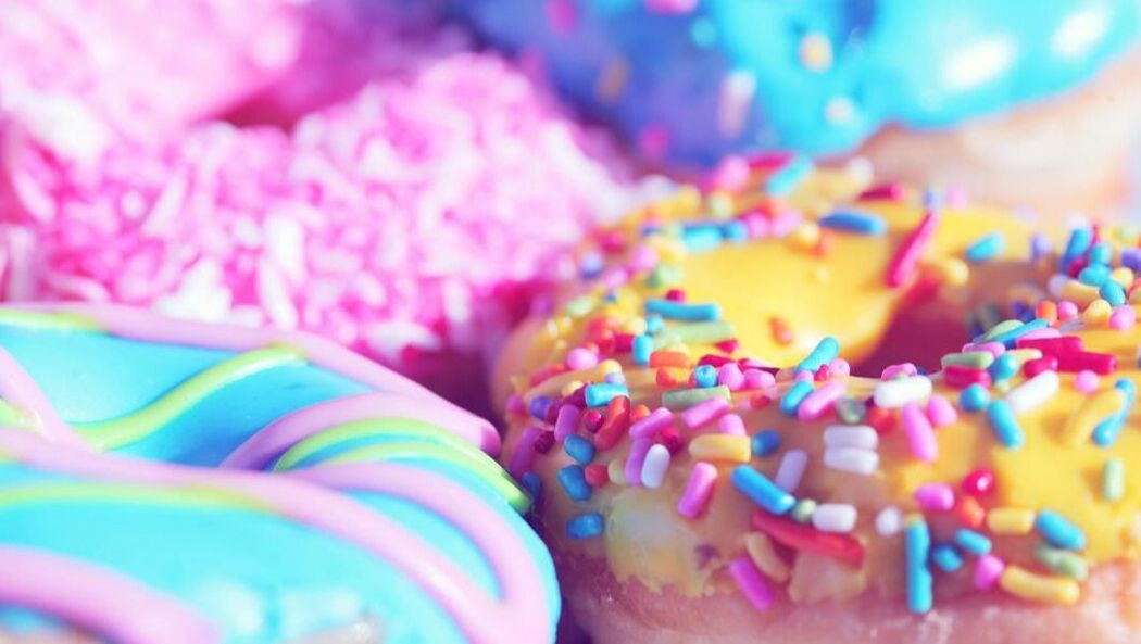 A picture of a variety of colorful doughnuts